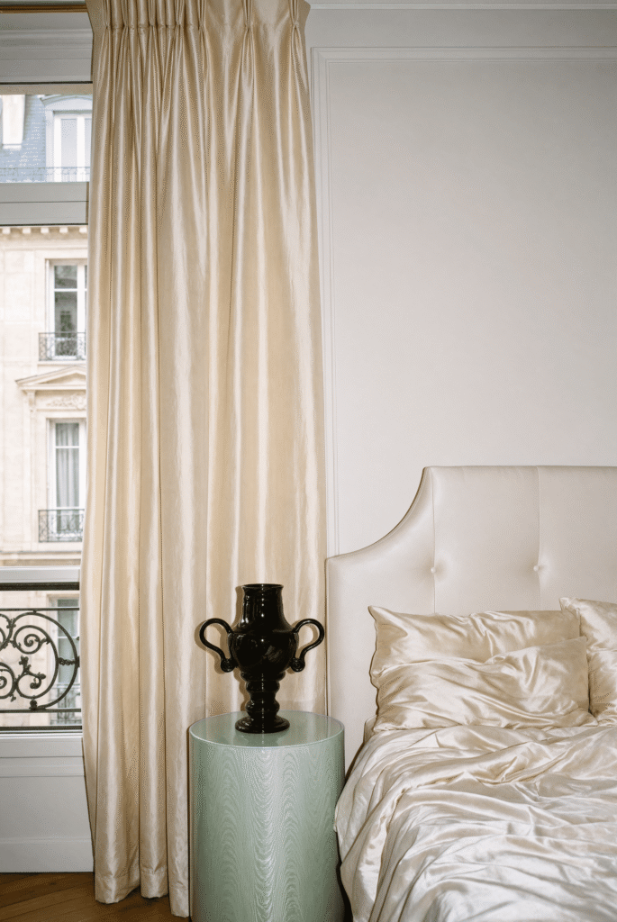 La Médicis in Paris Interior La Médicis black ceramic vase by Gazar Studio in a Parisian bedroom